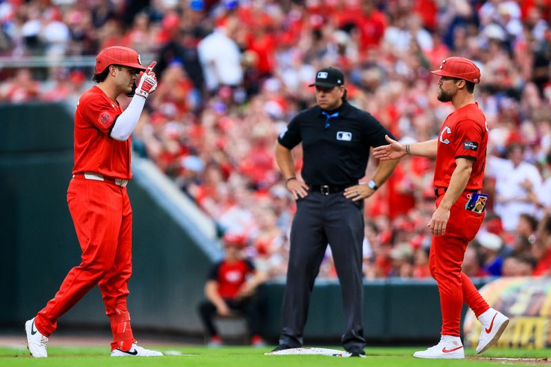 Sal Stewart reacts after hitting a two-run single in the third inning against the Miami Marlins at Great American Ball Park Saturday, Aug. 15. The RBIs, which came with two outs, were Stewart's 90th and 91st of the season.