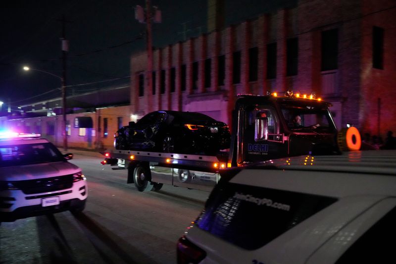 A black sedan is removed after being submerged in Mill Creek, leaving four people dead and one person hospitalized on Saturday, Aug. 15, 2026.