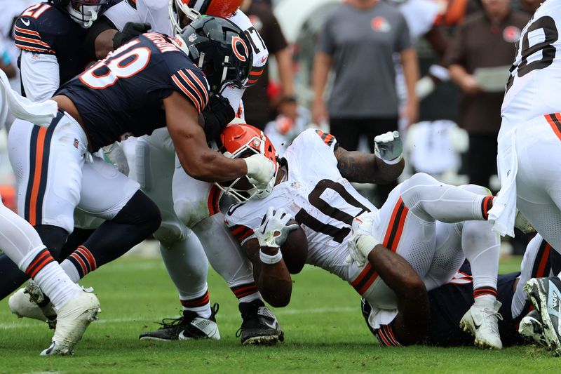Aug 15, 2026; Chicago, Illinois, USA; Cleveland Browns running back Quinshon Judkins (10) rushes the ball against the Chicago Bears during the first half at Soldier Field. Mandatory Credit: Mike Dinovo-Imagn Images