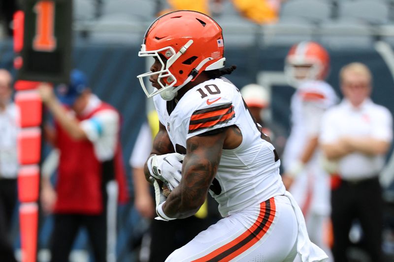 Aug 15, 2026; Chicago, Illinois, USA; Cleveland Browns running back Quinshon Judkins (10) rushes the ball against the Chicago Bears during the first half at Soldier Field. Mandatory Credit: Mike Dinovo-Imagn Images
