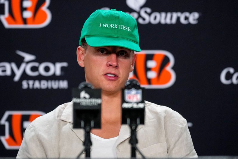 Cincinnati Bengals quarterback Joe Burrow (9) speaks in the post game press conference after the NFL Preseason game between the Cincinnati Bengals and the Detroit Lions at Paycor Stadium in Cincinnati on Thursday, Aug. 13, 2026. The Bengals won the preseason opener, 16-14.