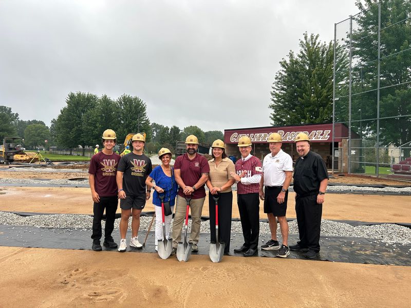Groundbreaking for major upgrades at Walsh University's baseball stadium was held on Monday, Aug. 17. Attending the ceremony were (from left) baseball players Bryce Broom and Ryan Bruni, donors Judith Lynne Biery, Ben Biery and Michelle Biery, university president Tim Collins, head baseball coach Tim Mead and university chaplain Rev. Ryan Furlong.