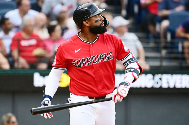 Guardians right fielder Jo Adell watches his 455-foot, three-run home run in the first inning against the San Francisco Giants, Aug. 18, 2026, in Cleveland.