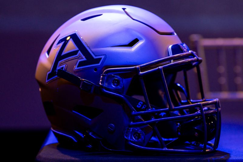 A football helmet is seen on display before the University of Akron's "Offensive Coordinator of the Game" promotional event, Aug. 19, 2026, at House Three Thirty in Akron, Ohio.