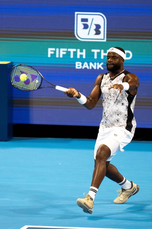 Frances Tiafoe, of United States, returns to Felix Auger-Aliassime, of Canada, at the Cincinnati Open at the Lindner Family Tennis Center in Mason, Ohio, on Wednesday, August 19, 2026.