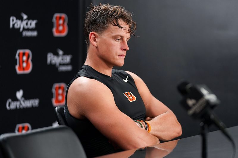 Cincinnati Bengals Joe Burrow takes questions from media during a press conference after practice at Paycor Stadium, Thursday, Aug. 20, 2026, in downtown Cincinnati.