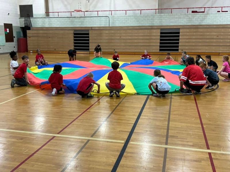Spring Hill Elementary students get ready to launch a parachute in gym class in May 2026. Springfield Local Schools restored its physical education, art and music classes in the middle of the 2025-2026 school year after voters approved its renewal property tax levies.
