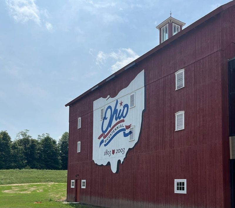 The Ohio Bicentennial logo on the side of the barn was originally pained in 1999 for Ohio's 200th birthday in 2003, but the original artist repainted the logo during the 2025-26 renovation process.