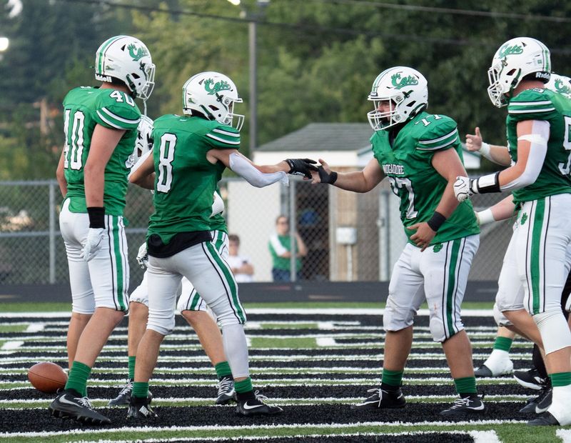 Mogadore’s Kade Thomas celebrates with teammates after a touchdown. Mogadore hosted Crestwood in a week 1 football game on Aug. 21, 2026.