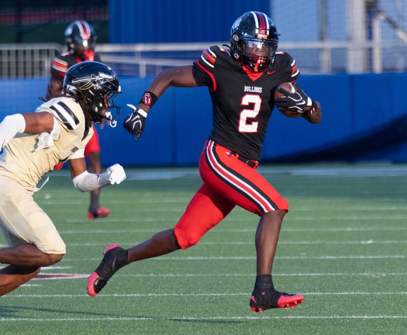 McKinley’s DeMarco Richardson Jr. runs against Harding on Friday, August 21, 2026.