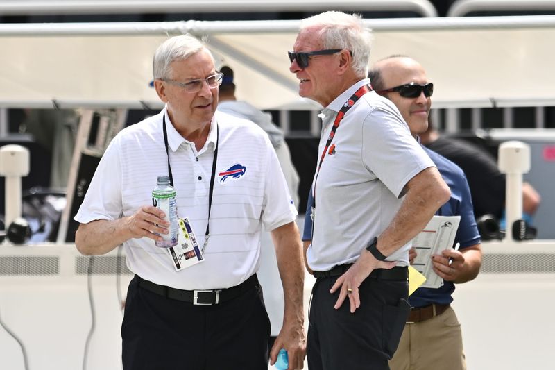 Buffalo Bills owner and president Terry Pegula, left talks to Cleveland Browns managing and principal partner Jimmy Haslam before a preseason game between the Browns and the Bills on Aug. 22, 2026, in Cleveland.