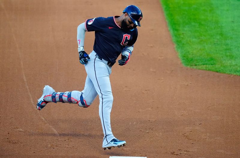Cleveland Guardians' Jo Adell circles the bases after hitting a three-run home against the Colorado Rockies on Aug. 22, 2026, in Denver, Colorado.