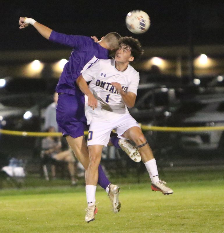 Ontario's Conner Warfel and Lexington's Cayden Brown battle for the ball as the Warriors and Minutemen battled to a 3-3 tie in nonconference boys soccer action on Saturday, Aug. 22, 2026 at Lexington High School.