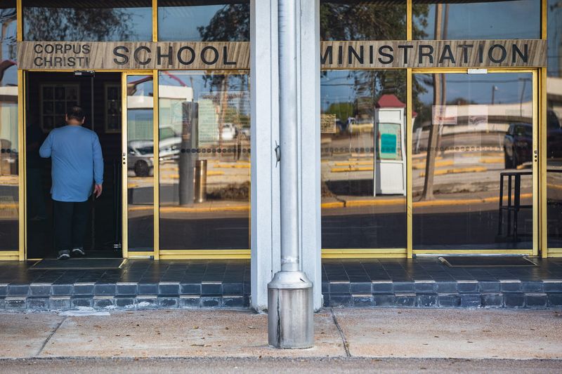 A man enters the Corpus Christi Independent School District administration office building on Monday, Dec. 5, 2022, in Corpus Christi, Texas.