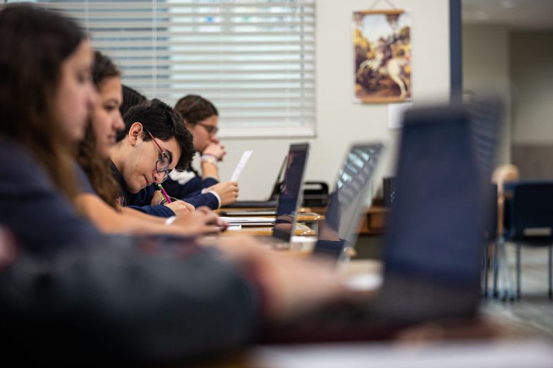 Junior Nickolas Cantu works on an assignment during a literature class at Annapolis Christian Academy on Friday, April 14, 2023, in Corpus Christi, Texas.