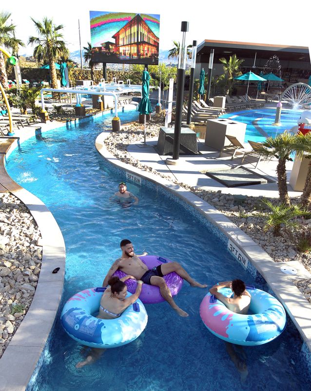 Visitors to The Swim Club at The Elmont float along in tubes Wednesday evening, June 7, 2023. It is located at 240 W. Castellano Drive within the Montecillo community.