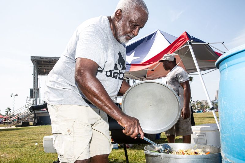 In this 2023 file photo, Lloyd Adamson stirs mixed vegetables during the Juneteenth Festival at Water's Edge Park in Corpus Christi.