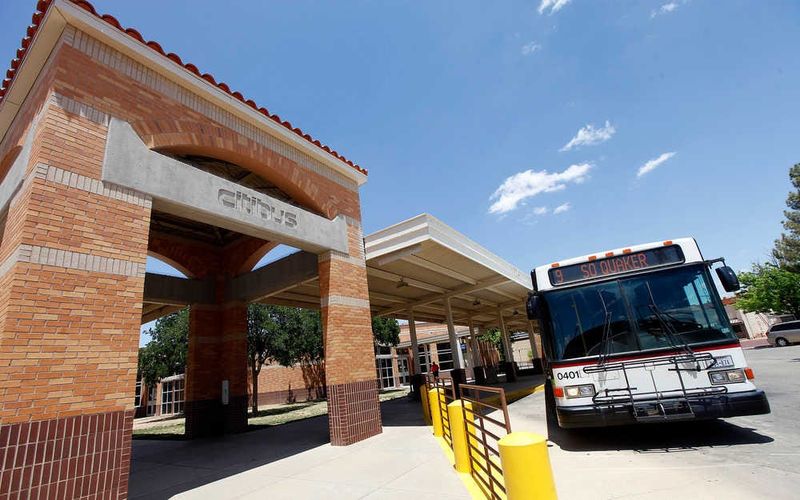 A bus stops at the Downtown Citibus Transfer Plaza.