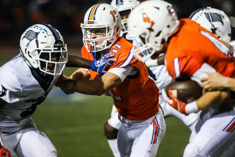 Central's Tanner Dabbert, center, blocks Richland as 	Jackson Timme carries the ball Friday, Oct. 19, 2018, at San Angelo Stadium.