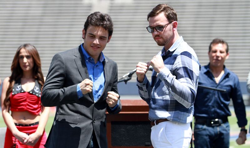 Julio Cesar Chavez Jr., left, and his opponent Andy Lee posed for pictures at a press conference in the Sun Bowl Tuesday. Just prior to the event, the chancellor of the UT Board of Regents disallowed the June 16 fight to happen there citing security concerns. Promoters are now looking for another site in another city in Texas.
