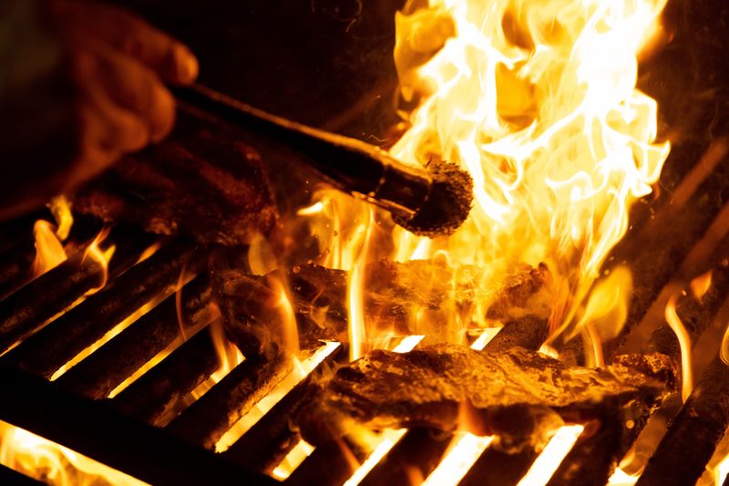 A steak is grilled at The Astor in this file photo from 2019. The restaurant, which opened in 1957, suffered a fire in early 2025 and remains closed as of December 2025.