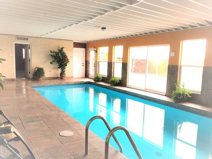 A photo shows a listing available Airbnb. In El Paso, residents are prohibited from renting out their pools for parties or events.