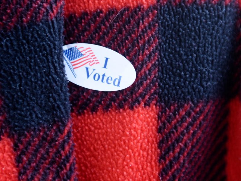 Jim Brandon wears an "I voted" sticker on Election Day, Tuessday, March 1, 2022, at Calvary Baptist Church. Polls are open from 7 a.m. to 7 p.m.