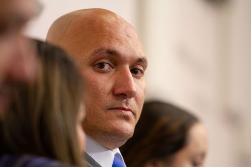 Jeremy Jordan, the husband of East-Central city Rep. Cassandra Hernandez sits in an Ethics Review Commision hearing on July 20, 2023, where his wife is facing a complaint over her 2022 city fuel card usage.