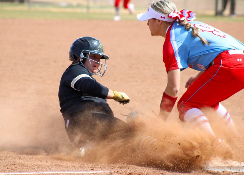 Amarillo's Danae Lopez is tagged out by Monterey's Tatiana Trotter at third base during their non-district high school softball game at Lady Plainsmen Field on Friday, March 18, 2022.