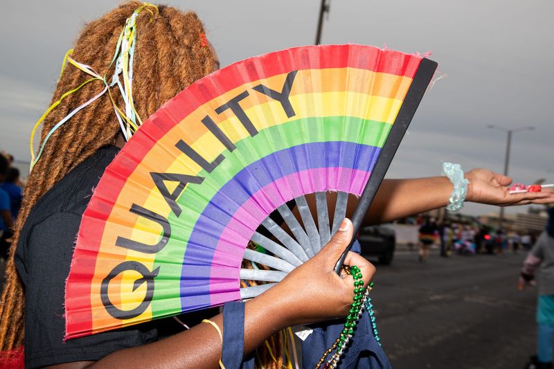 In this 2023 file photo, Kat Bailey hands out candy during the Pride Parade in Corpus Christi.