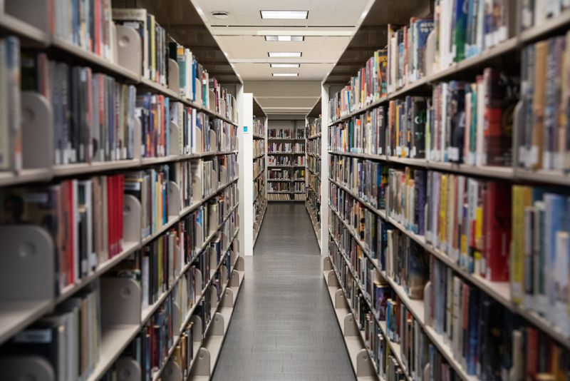 Bookshelves in La Retama Central Library are pictured in this 2023 file photo.