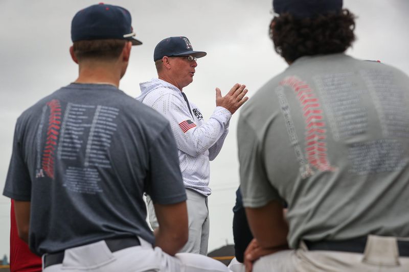 Veterans Memorial head baseball coach Lee Yeager speaks to the team during practice on Wednesday, Feb. 14, 2024, at the high school in Corpus Christi, Texas.