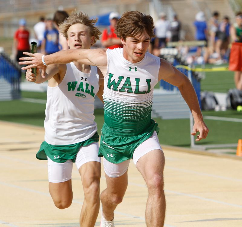 The Wall relay team passes off the baton at the Angelo State Spring Break Invitational at LeGrand Stadium on Thursday, March 14, 2024.