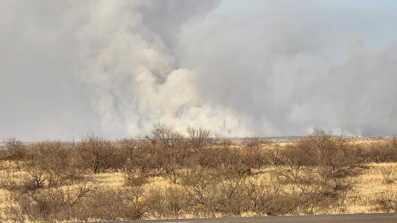 A 2022 file photo shows smoke from the Little Highline Fire as seen in the distance from Highway 287 north of Amarillo.