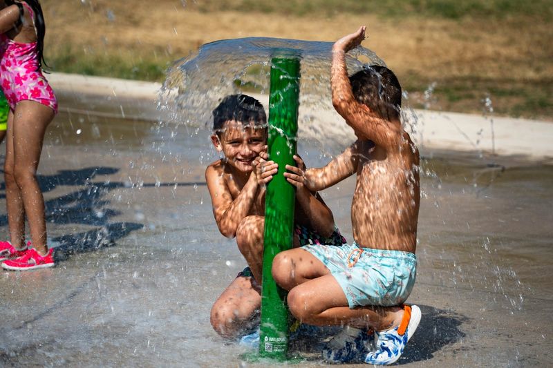 Kids play at the All-Tex Irrigation Splash Pad at San Angelo's Unidad Park.