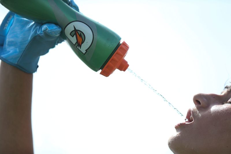 Flour Bluff freshman Alejandro Elizondo drinks water during Andrew Body's The Chosen 1 Flight Academy camp for high school football players on Tuesday, July, 30, 2024, in Taft, Texas.