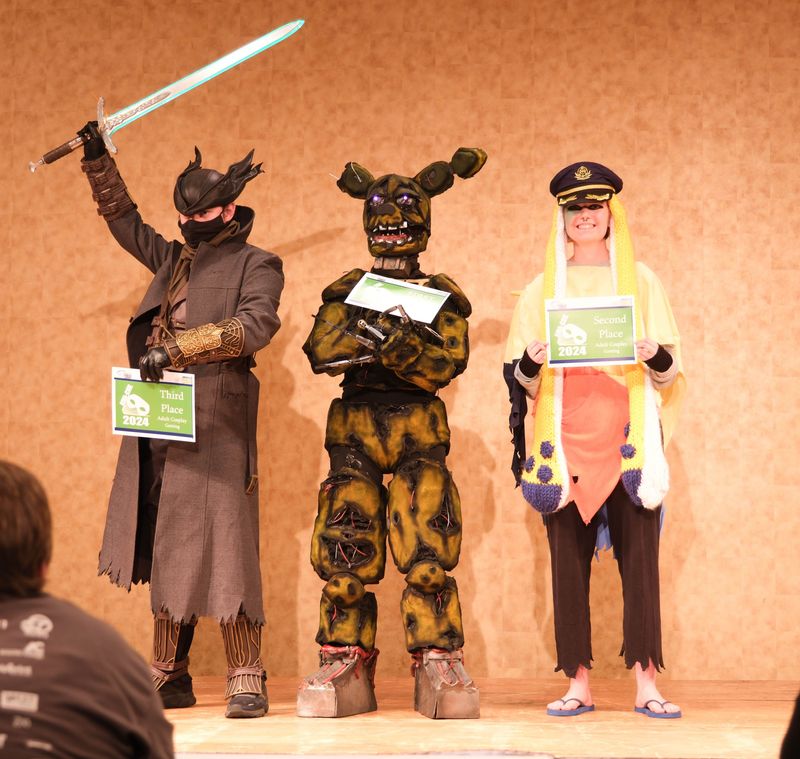 Award winners in the game cosplay contest stand on stage at a previous AMA-CON at the Amarillo Civic Center.