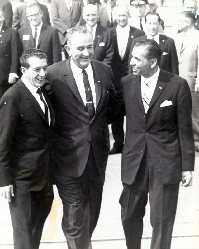 September 26, 1964 FRIENDLY TRIO - President Adolfo Lopez Mateos, left, President Lyndon B. Johnson; and Raymond Telles, U.S. Ambassador to Costa Rica, right, all joined arms Friday morning at Stanton Street Bridge ceremonies commemorating settlement of the Chamizal dispute.