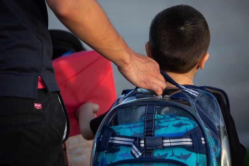 Parents walk their students to school for their first day at Mireles Elementary School on Monday, Aug. 12, 2024 in Corpus Christi, Texas.