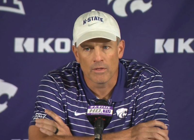 Kansas State associated head coach Matt Wells talks to reporters on Aug. 19, 2024, at Bill Snyder Family Stadium.