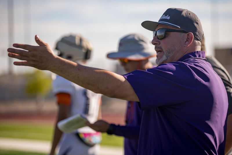 Eastlake head football coach Ruben Rodriguez talks to his team at practice on Tuesday, Aug. 20, 2024.