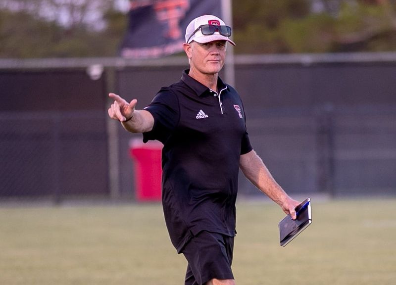 Texas Tech head coach Tom Stone gestures to the crowd during a non-conference soccer match, Thursday, August 22, 2024, at John Walker Soccer Complex.