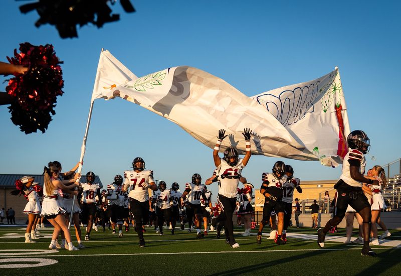 The Weiss Wolves take the field ahead of a Friday night match-up between the Wolves and the San Marcos Rattlers in San Marcos at Rattler Stadium, Sept. 6, 2024. Weiss won the game 54-0.