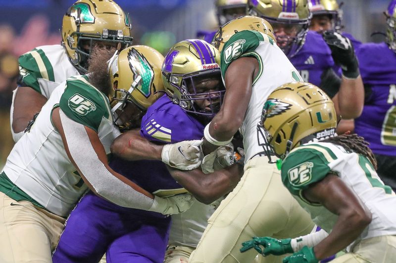Mille's Broderick Taylor is tackled by DeSoto during Friday's game at the Alamodome on Sept. 13, 2024, in San Antonio, Texas.