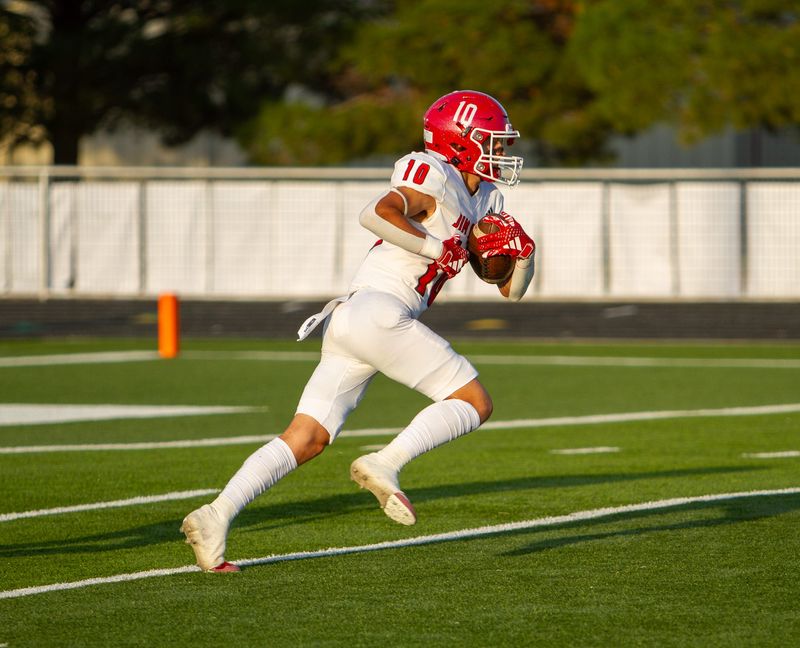 Jim Ned football's Canton Golson (10) returns the opening kickoff in a matchup against Wall at Hawk Stadium on Friday, on Sept. 13, 2024.