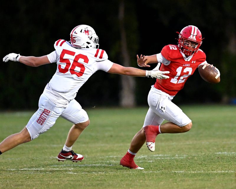 Miles offensive lineman Jaxon Petillo chases Albany quarterback Chip Chambers during Friday’s game in Albany Oct. 11, 2024. Final score was 47-15, Albany.