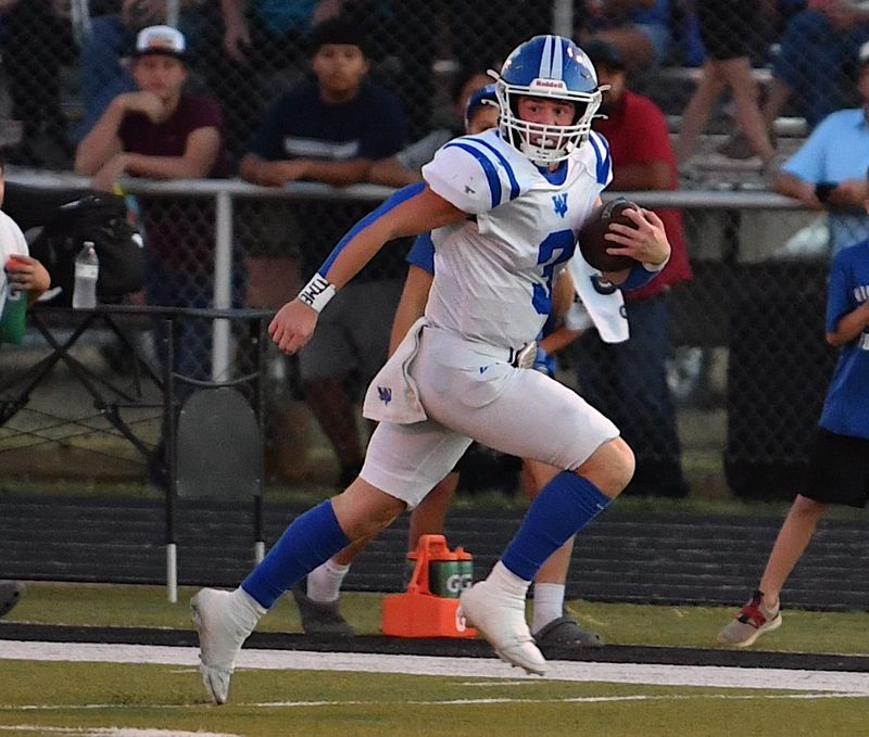 Windthorst's Brock Belcher runs the ball during a game against Archer City on Friday, October 11, 2024 in Archer City.