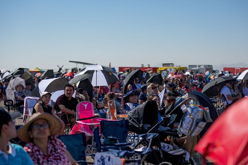 People watched as the U.S. Army Golden Knights performed during the Amigo Airsho at Biggs Army Airfield inside the Fort Bliss Army post on Saturday, Oct. 12, 2024, which returned after 12 years.