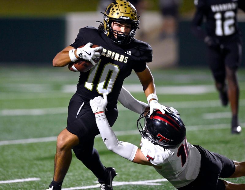 Abilene High wide receiver Adrian Munoz pushes away Amarillo Tascosa defensive back Shepherd Stapp during Friday’s game at Shotwell Stadium in Abilene Oct. 25, 2024. Final score was 31-29, Abilene High.