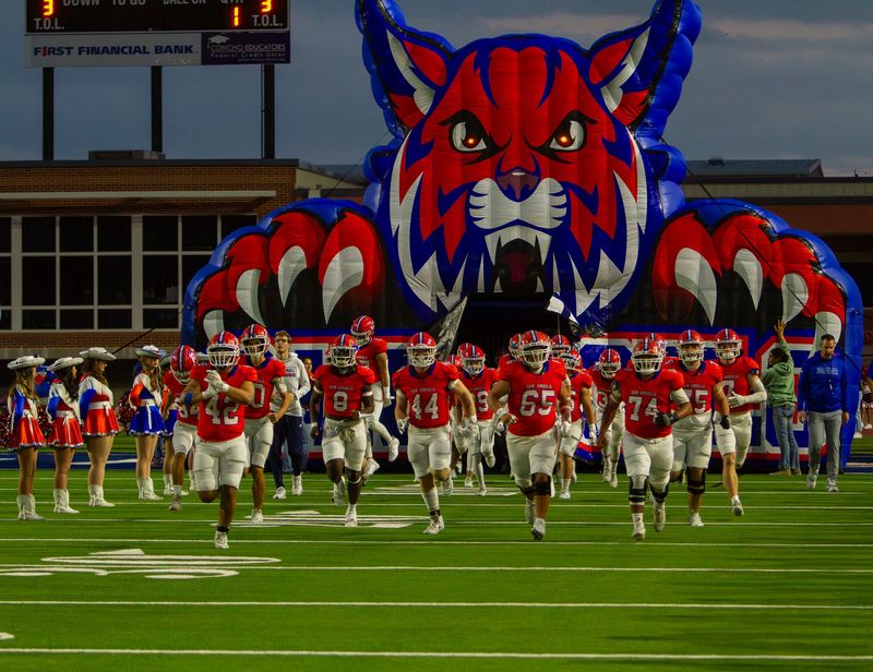 The San Angelo Central football team runs through the tunnel before a game against Odessa at San Angelo Stadium on Friday, Nov. 1, 2024.